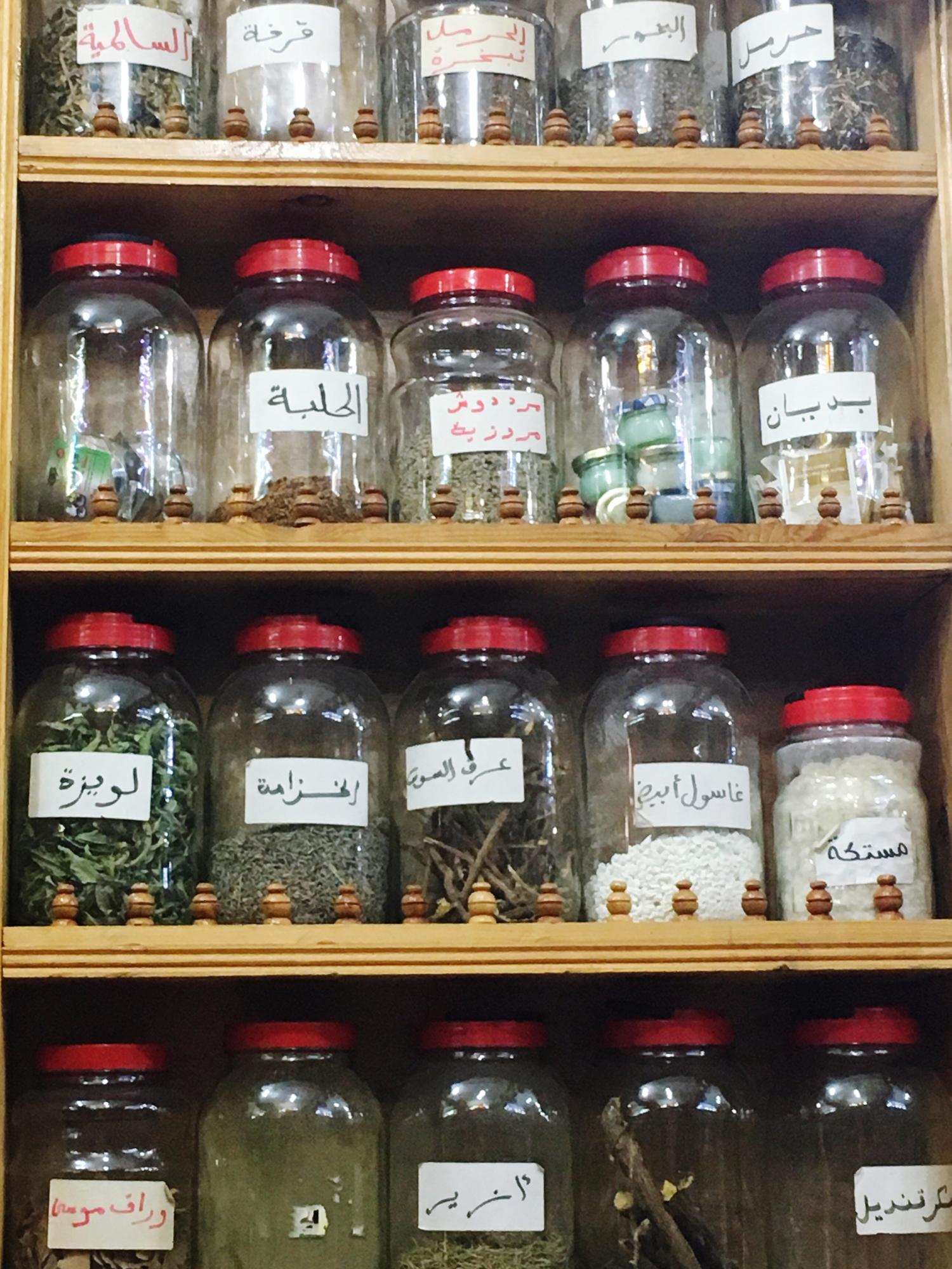 Artisanal pantry with labeled jars and spices